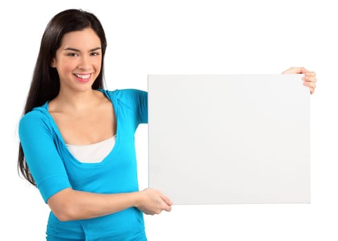 A beautiful young woman is holding and showing a blank white sign.