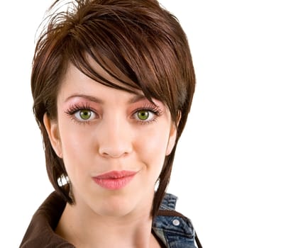 A beautiful young lady is looking at the camera.