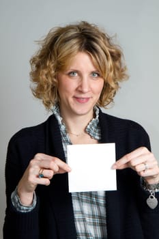 blond girl with card