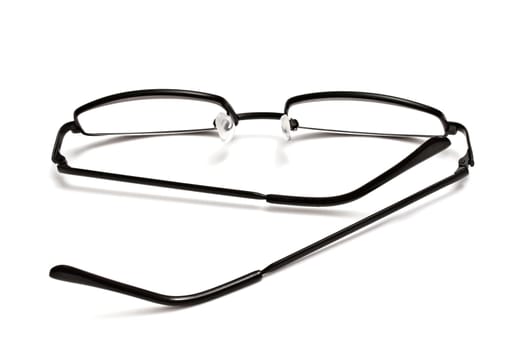 Reading glasses isolated on white background