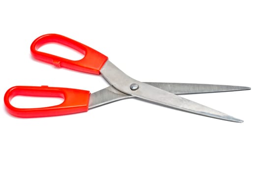 Red handled scissors isolated on white background