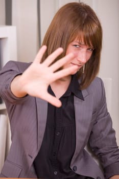 overworked business woman with stop hand sign