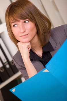 business woman holding application file and smiling