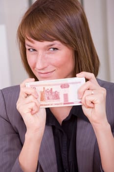 happy business woman holding russian money