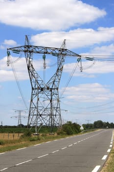 a tower to a power near a road