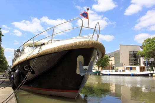 photo of the bow of a pleasure boat in a port