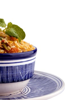Freshly cooked biryani in a ceramic bowl