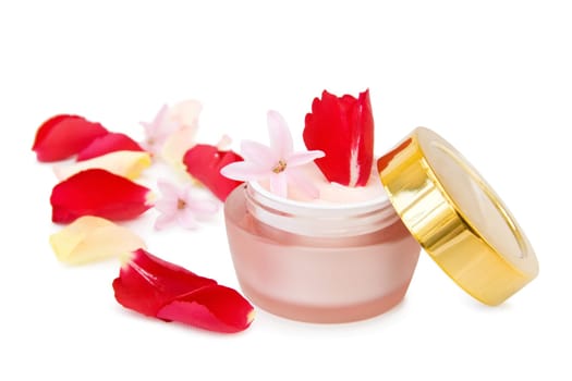 Natural face cream with roses. Isolated over white background.
