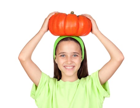 Happy girl in Halloween with a big pumpkin isolated on white background
