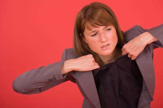 stressed business woman ripping her suit
