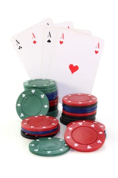 colorful chips and playing cards against white background