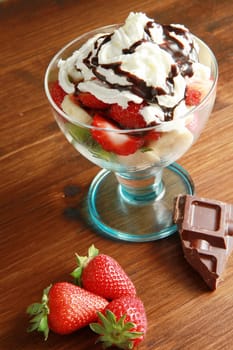 Fresh fruits salad on wooden table