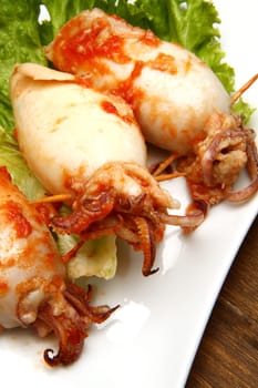 calamaru with tomatoes