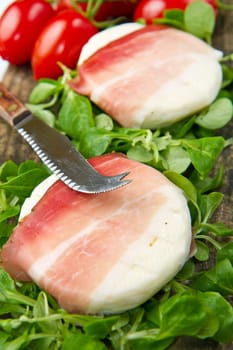 italian tomino cheese with bacon