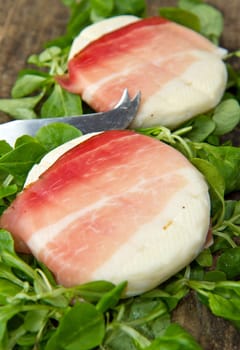 italian tomino cheese with bacon