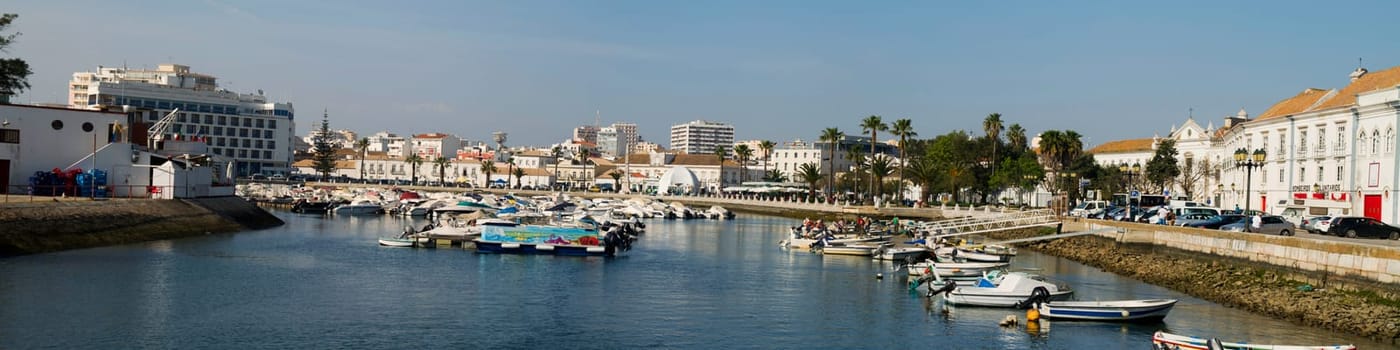 View of the marina with traditional fishing boats on Faro,  Portugal.