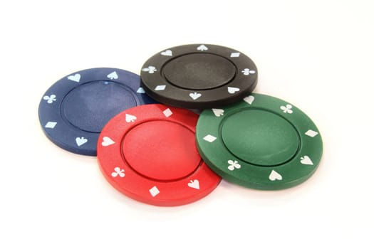 Colorful tokens against white background