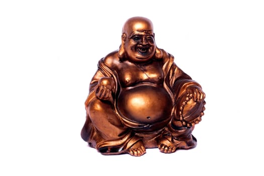 Close up view of a Buddha statue isolated on a white background.