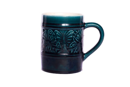 Close view detail of a retro mug isolated on a white background