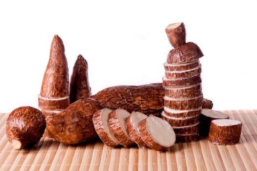 Close up view of the cassava root isolated on a white background.