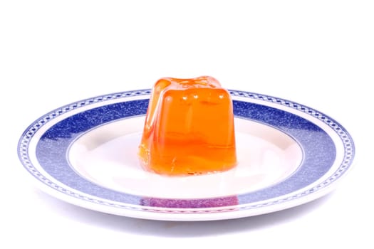 Close up view of  a orange gelatin isolated on a white background.