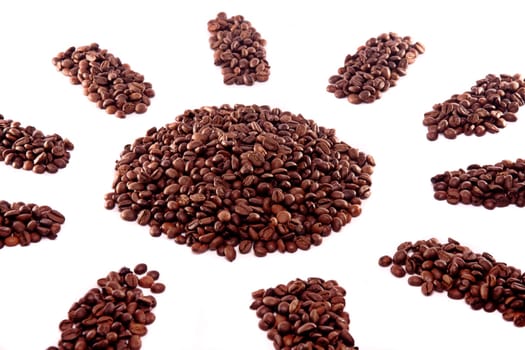 Close up view of a bunch of roasted beans of coffee.