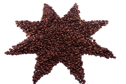 Close up view of a bunch of roasted beans of coffee.