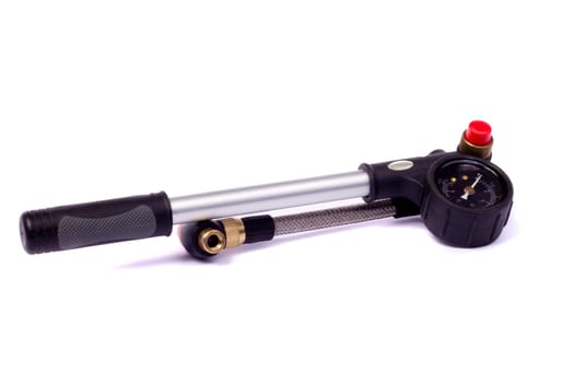 Close up view of a bicycle air pump isolated on a white background.