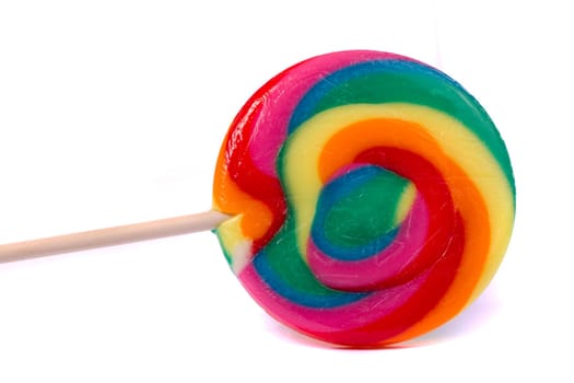 Close up view of a sweet lollipop isolated on a white background.