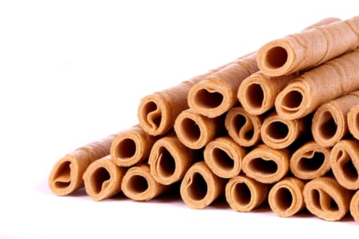 Close up view of a bunch of cookie sticks isolated on a white background.