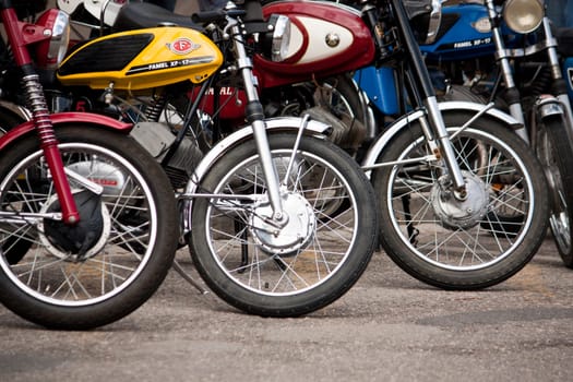 Close up view of classic vespa motorbike on the outdoors.