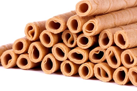 Close up view of a bunch of cookie sticks isolated on a white background.
