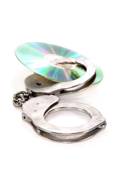 a blank CD with handcuffs