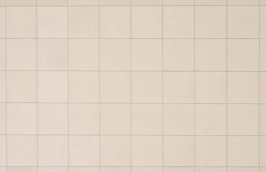 Beige tiled wall, perfect as a background