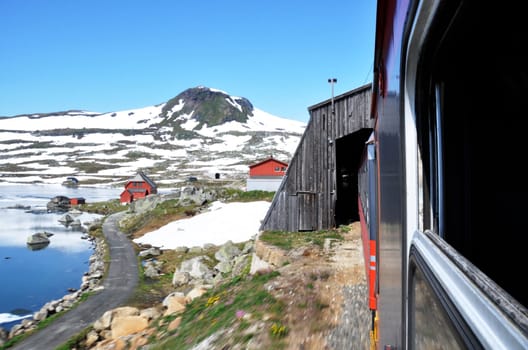 Travel by train across Norway in summer