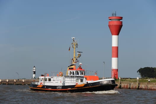 Pilot ship with lighthouse