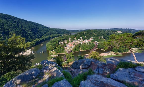 View over historical civil war town of Harpers Ferry, a National Park owned town, by the confluence of the Potomac and Shenandoah rivers