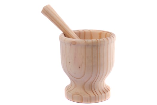 Close up view detail of a wooden garlic smasher isolated on a white background.