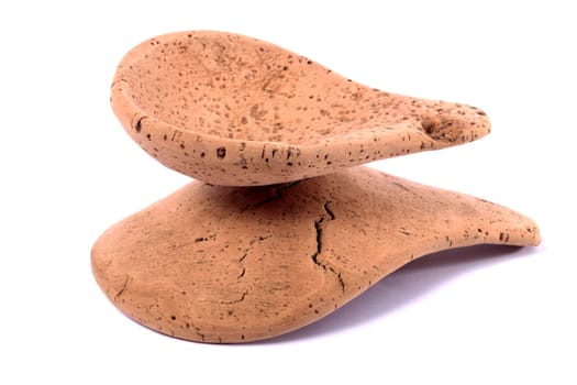 Close up view detail of a traditional handmade drinking utensil called "cocho"" carved from cork from the interior regions of Portugal."