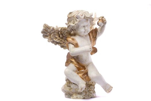 Close up view detail of a ceramic angel isolated on a white background.