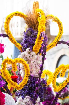 Beautiful procession of torches decorated with flowers, held in S.Bras de Alportel, Portugal.