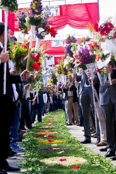 Beautiful procession of torches decorated with flowers, held in S.Bras de Alportel, Portugal.