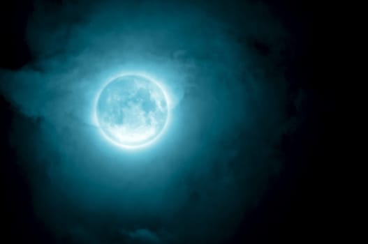 Glowing Moon Close-up on Dakb Blue Sky