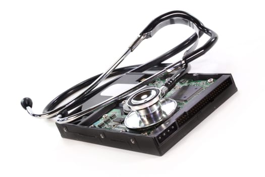 a hard drive and stethoscope voe white background