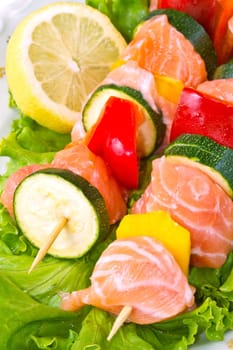 salmon kebab with zucchini and peppers