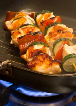 salmon kebab with zucchini and peppers