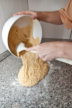 Yeast dough is placed on the work surface for further processing