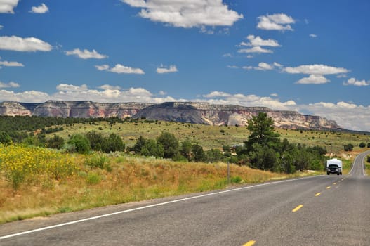 Truck with caravan on the highway,Utah,USA
