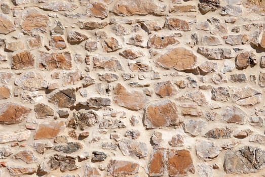 stone wall of a building in the countryside of Tuscany