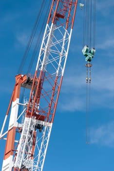 cranes with a hook on a construction site